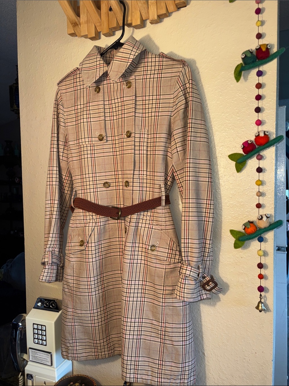 EUC Express Plaid Trench Coat featuring a classic tan-and-brown plaid pattern an